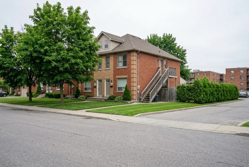 Brick house converted into separate rental units with two front entrances